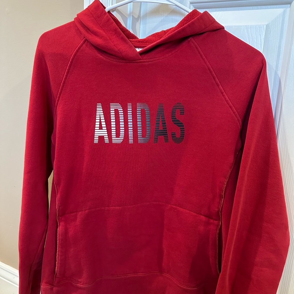 Adidas sweatshirt.